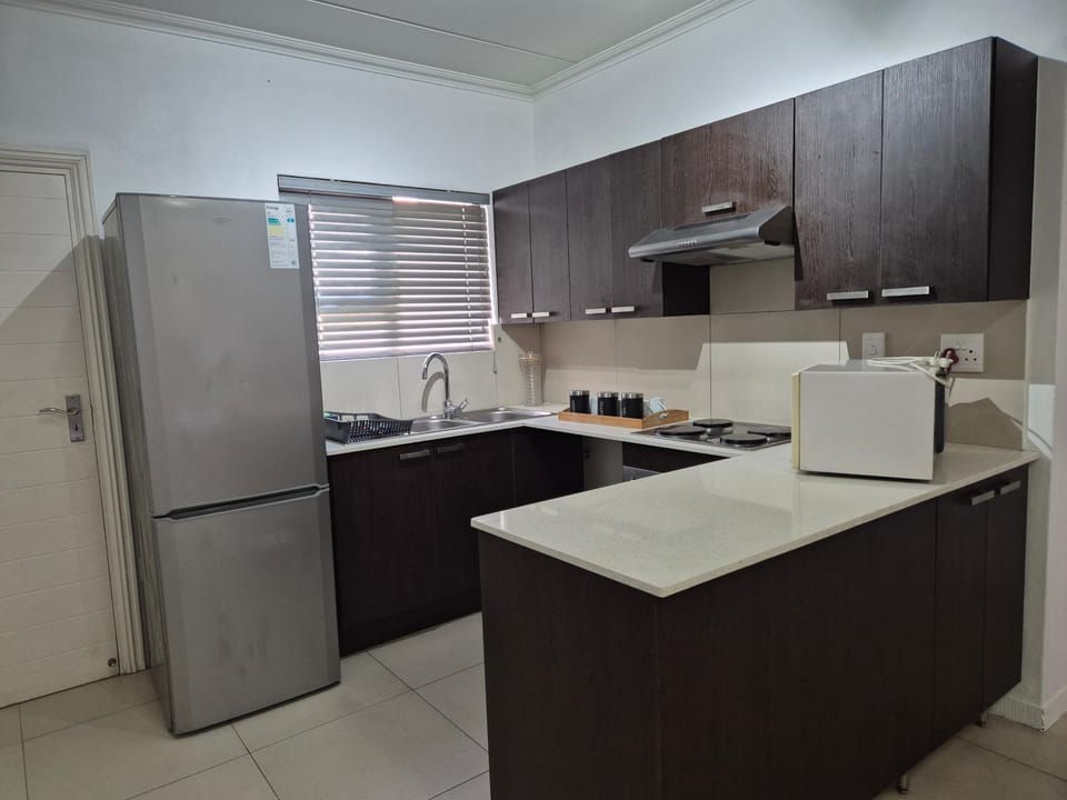 Kitchen or kitchenette, oven, stove, toaster