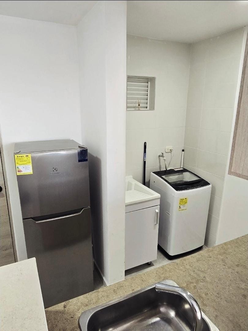 Kitchen or kitchenette, washing machine, dryer