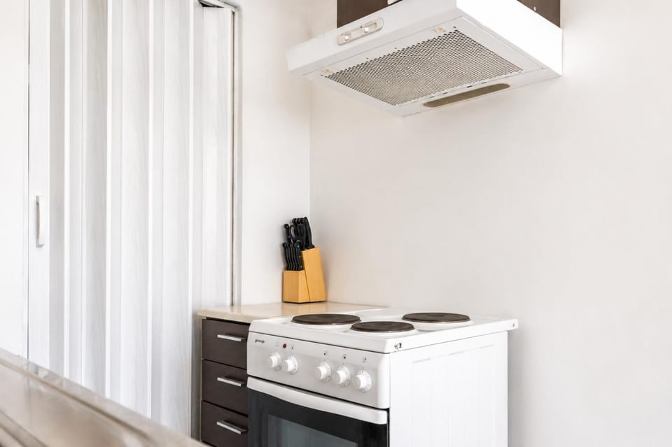 Kitchen or kitchenette, oven, stove
