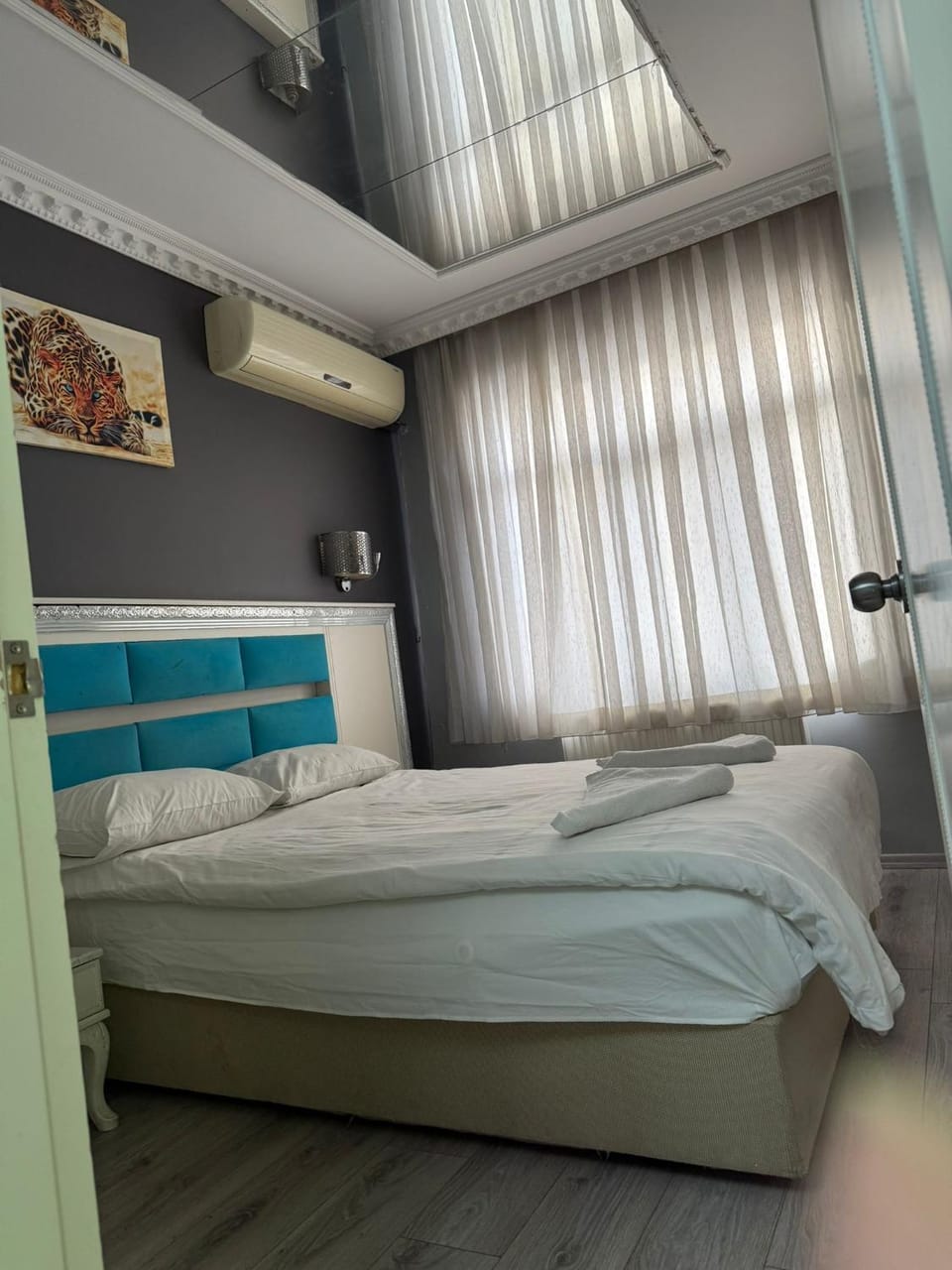 Bed, Photo of the whole room, Bedroom, towels, air conditioner