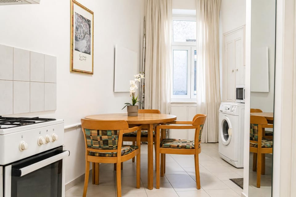 Kitchen or kitchenette, Seating area, Dining area, oven, stove, toaster, washing machine