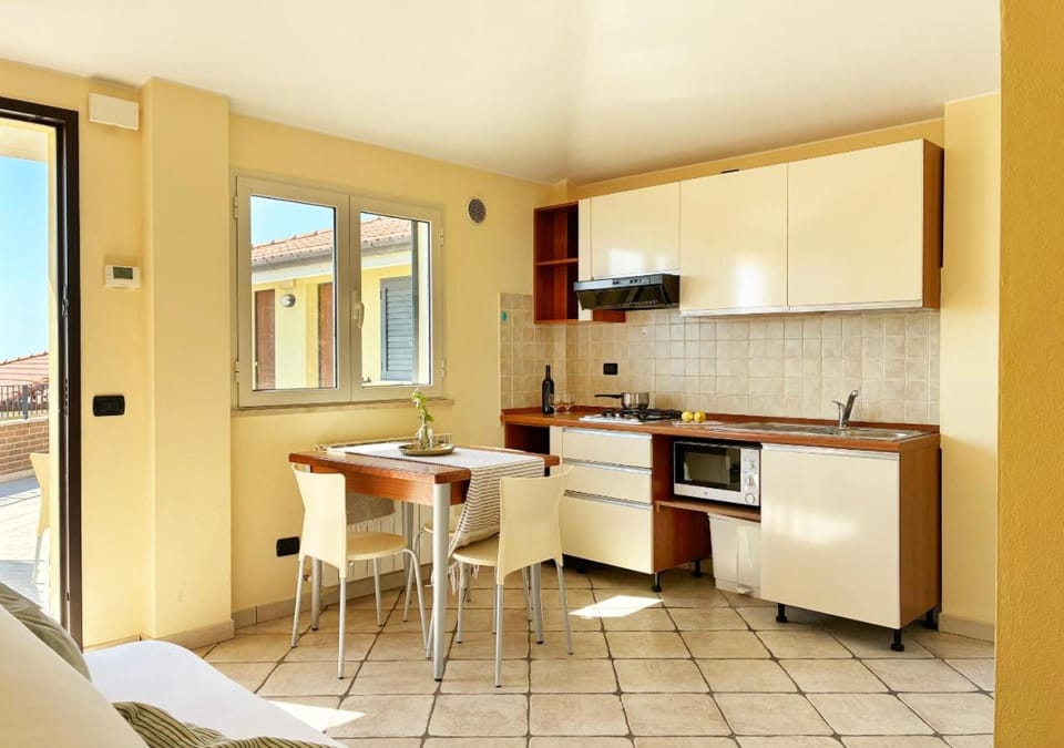 Kitchen or kitchenette, Living room, Seating area, Dining area, oven, stove, kitchen