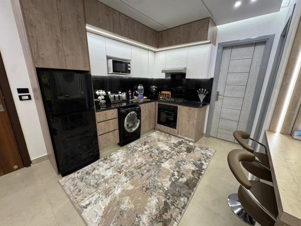 Kitchen or kitchenette, oven, stove, toaster