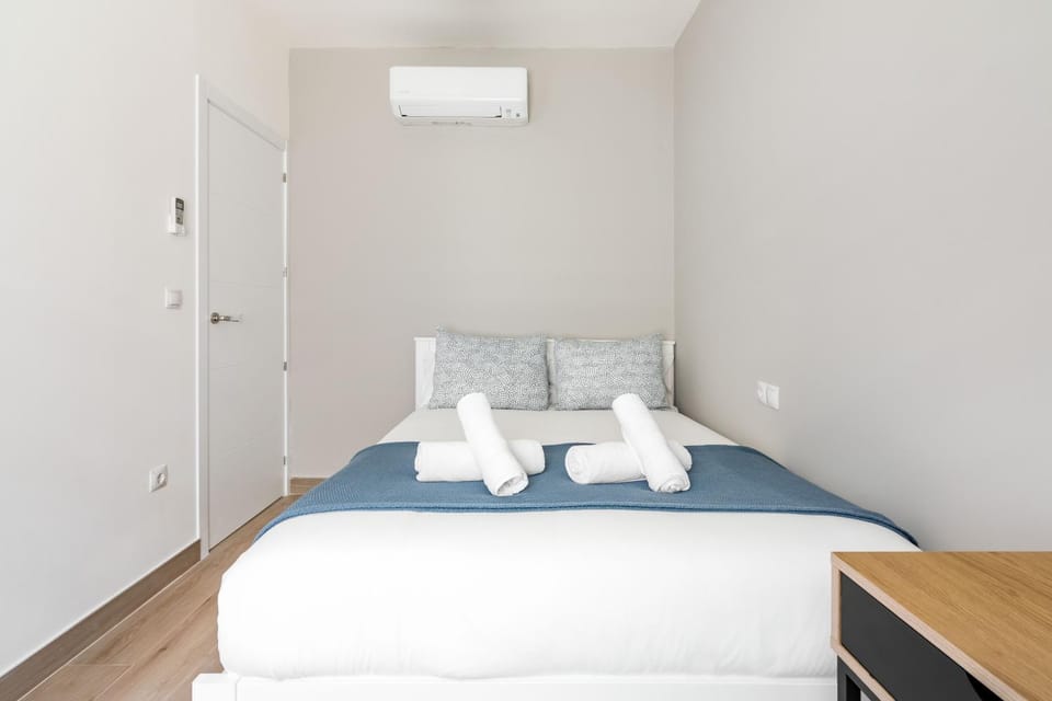 Bed, Photo of the whole room, Bedroom, towels, air conditioner