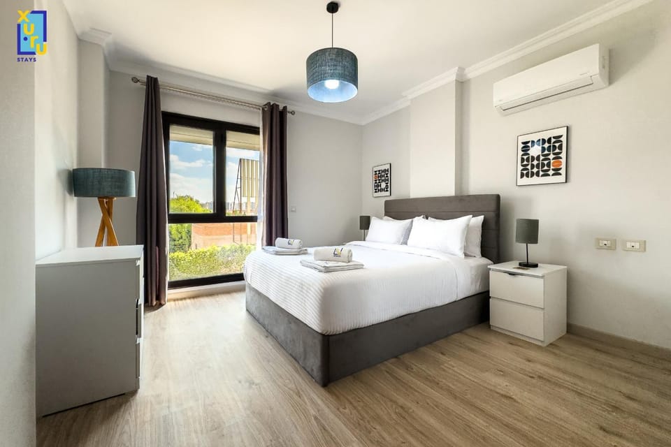 Alluring & Modern 2BDR Apt 5 min To CAI Airport Apartment in New Cairo City
