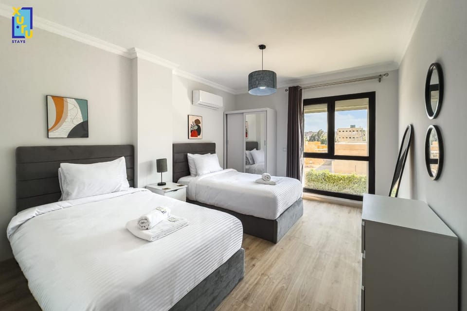 Alluring & Modern 2BDR Apt 5 min To CAI Airport Apartment in New Cairo City