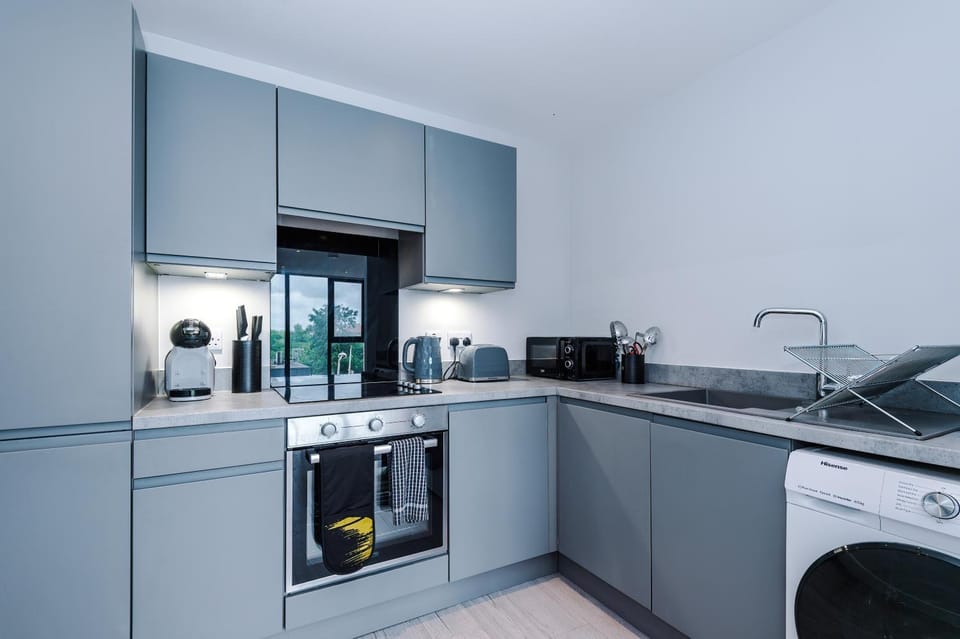 Kitchen or kitchenette, washing machine