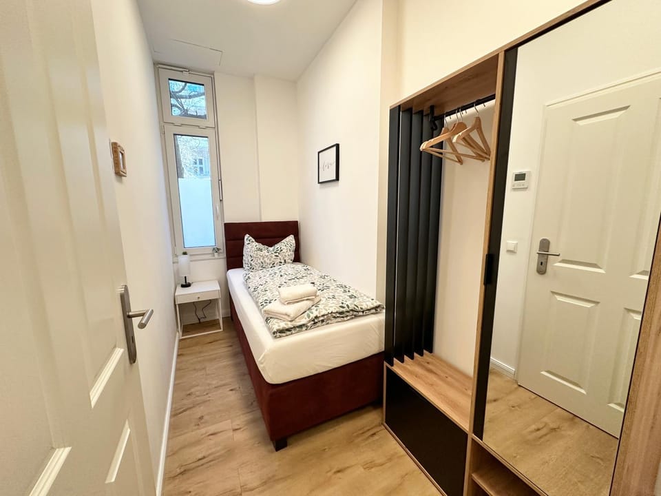 Bed, wardrobe, air conditioner