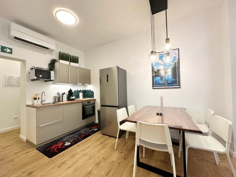 Dining area, microwave, oven, stove, kitchen, air conditioner