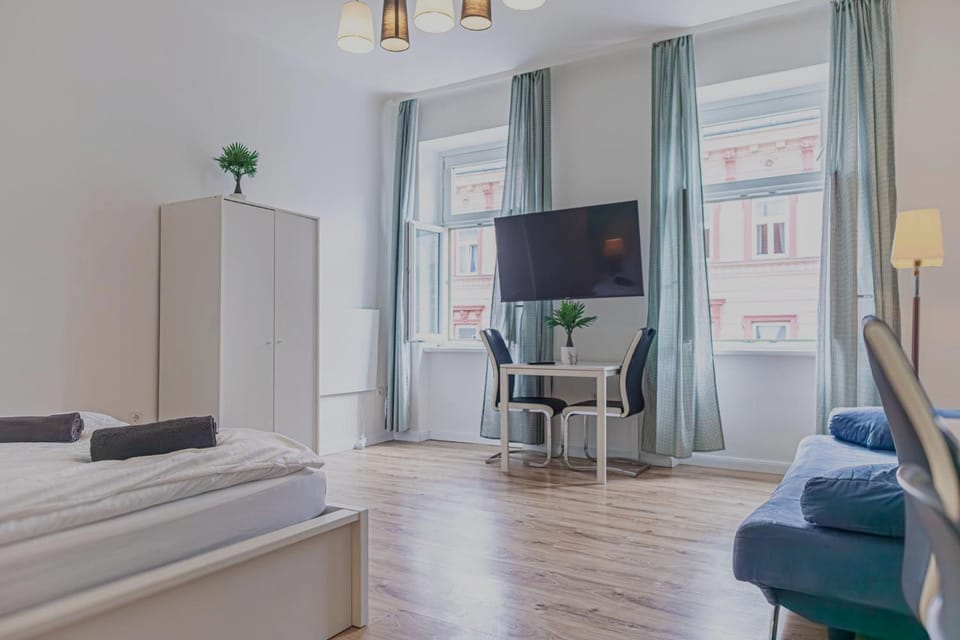 Property building, Bed, Seating area, Bedroom
