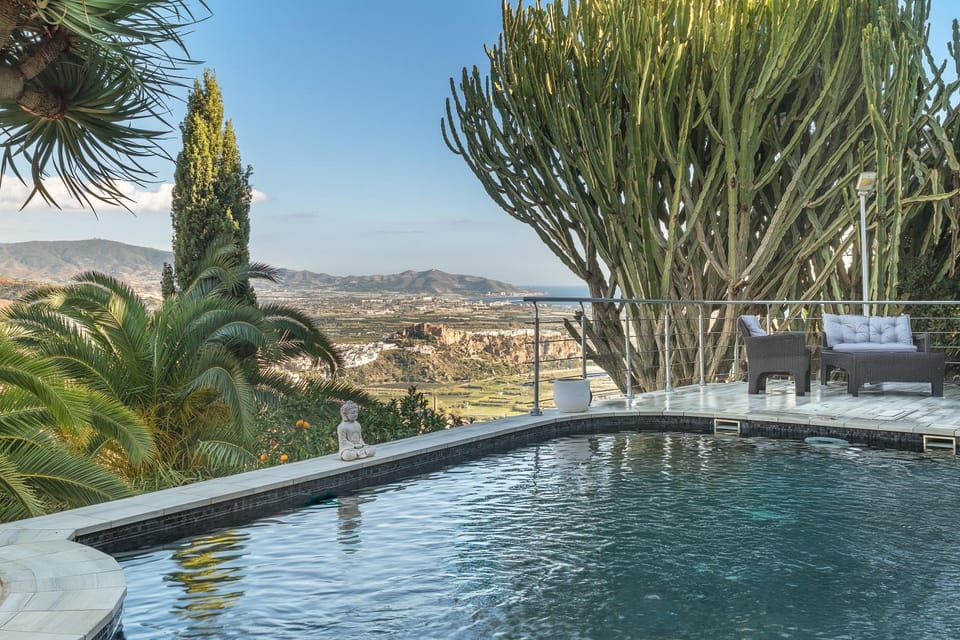 Property building, Living room, Swimming pool