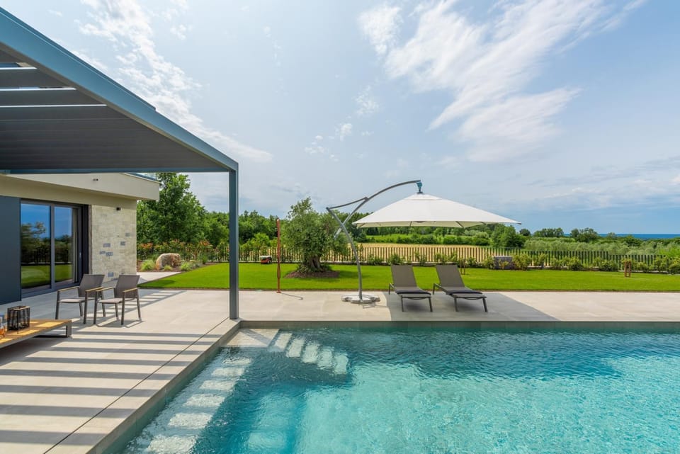 Natural landscape, Garden, Pool view, Sea view, Swimming pool, sunbed