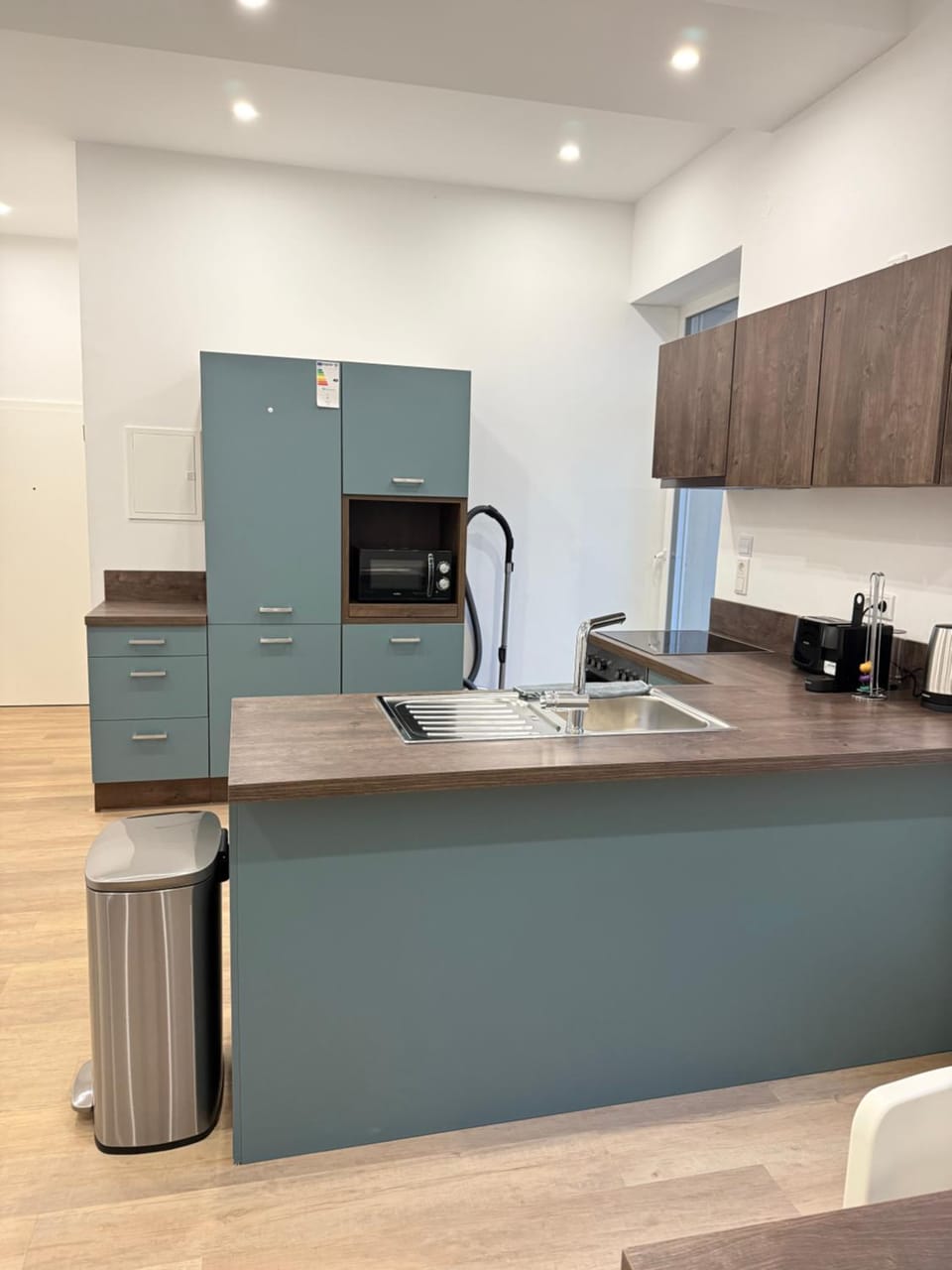 Kitchen or kitchenette, dishwasher, oven, stove, toaster