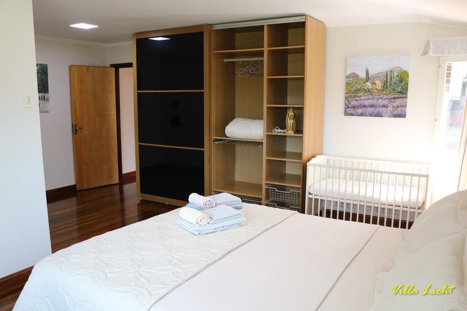 Bedroom, cot, bunk bed, wardrobe, air conditioner
