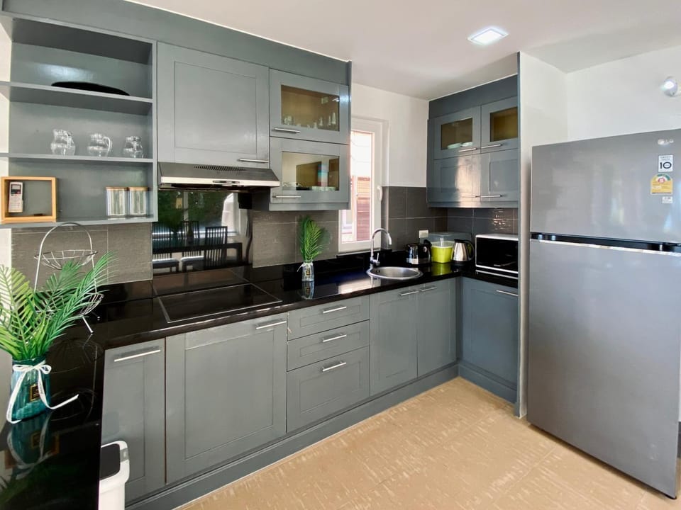 Kitchen or kitchenette, stove, toaster