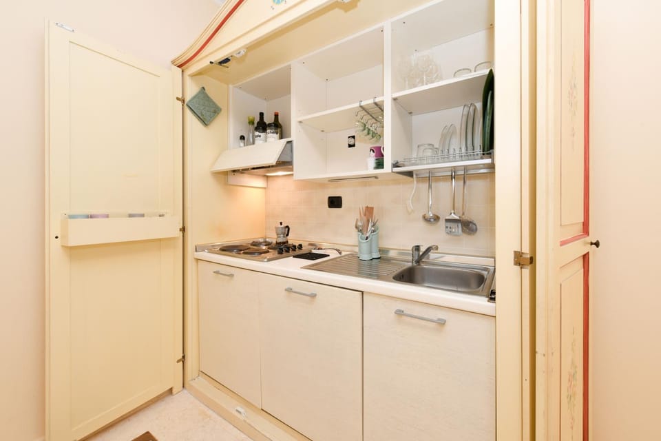 Kitchen or kitchenette, stove