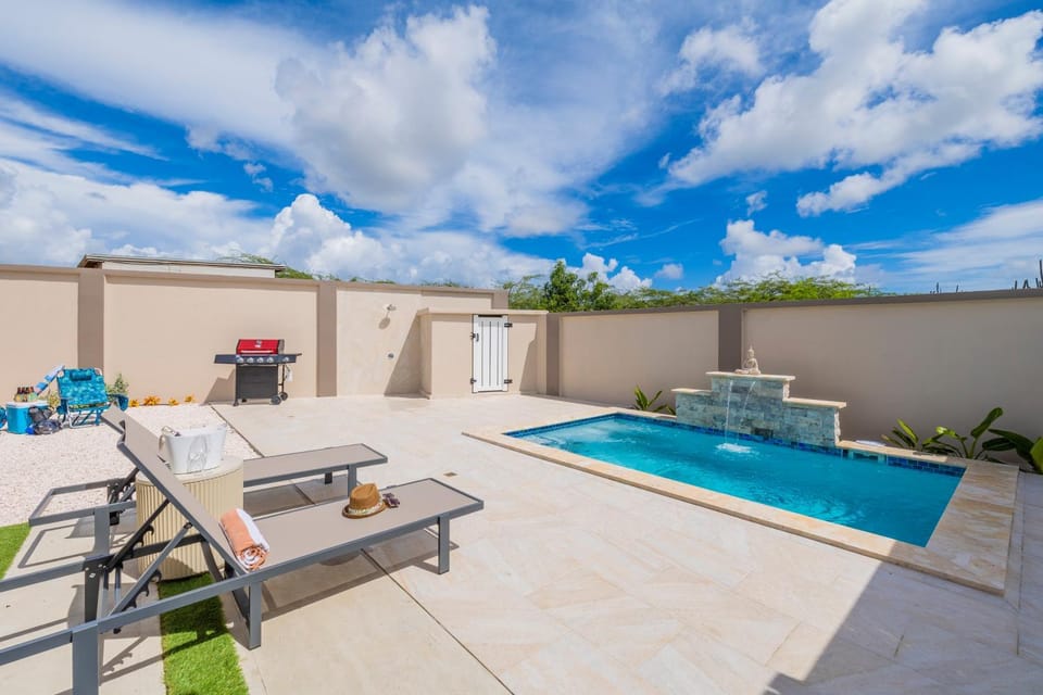 Swimming pool, sunbed