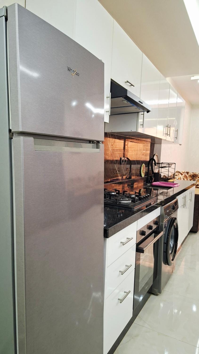 Kitchen or kitchenette, oven, stove