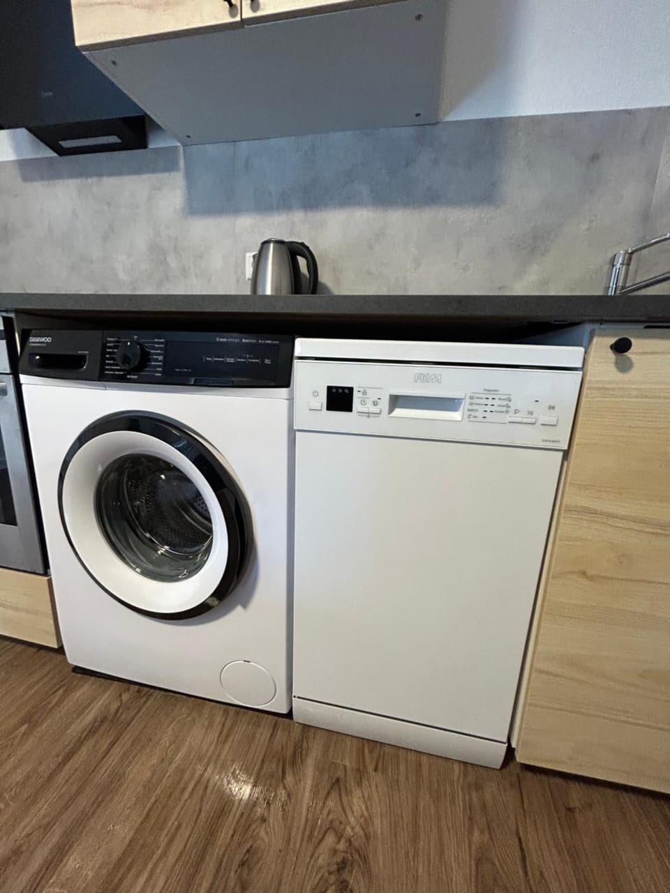 Kitchen or kitchenette, washing machine