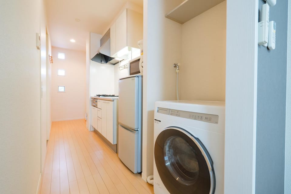 Kitchen or kitchenette, washing machine, dryer