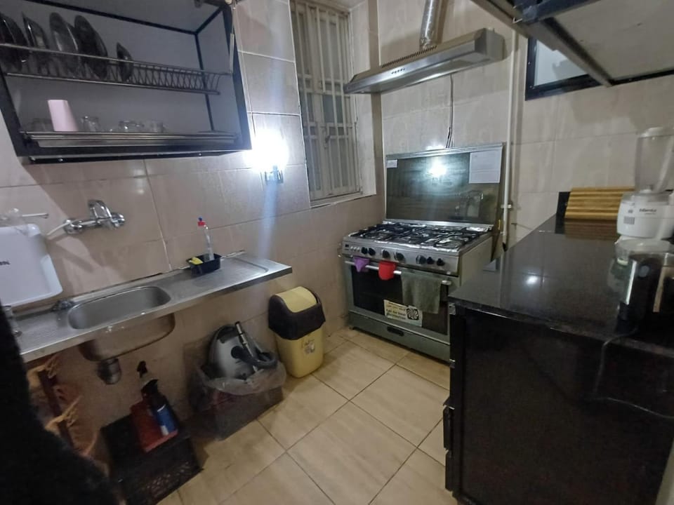 Kitchen or kitchenette, oven, stove