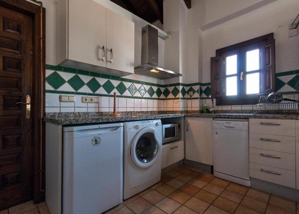 Kitchen or kitchenette, washing machine
