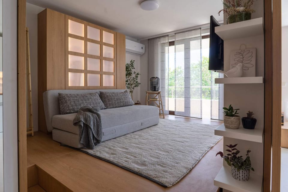 Bed, Living room, Seating area, Bedroom