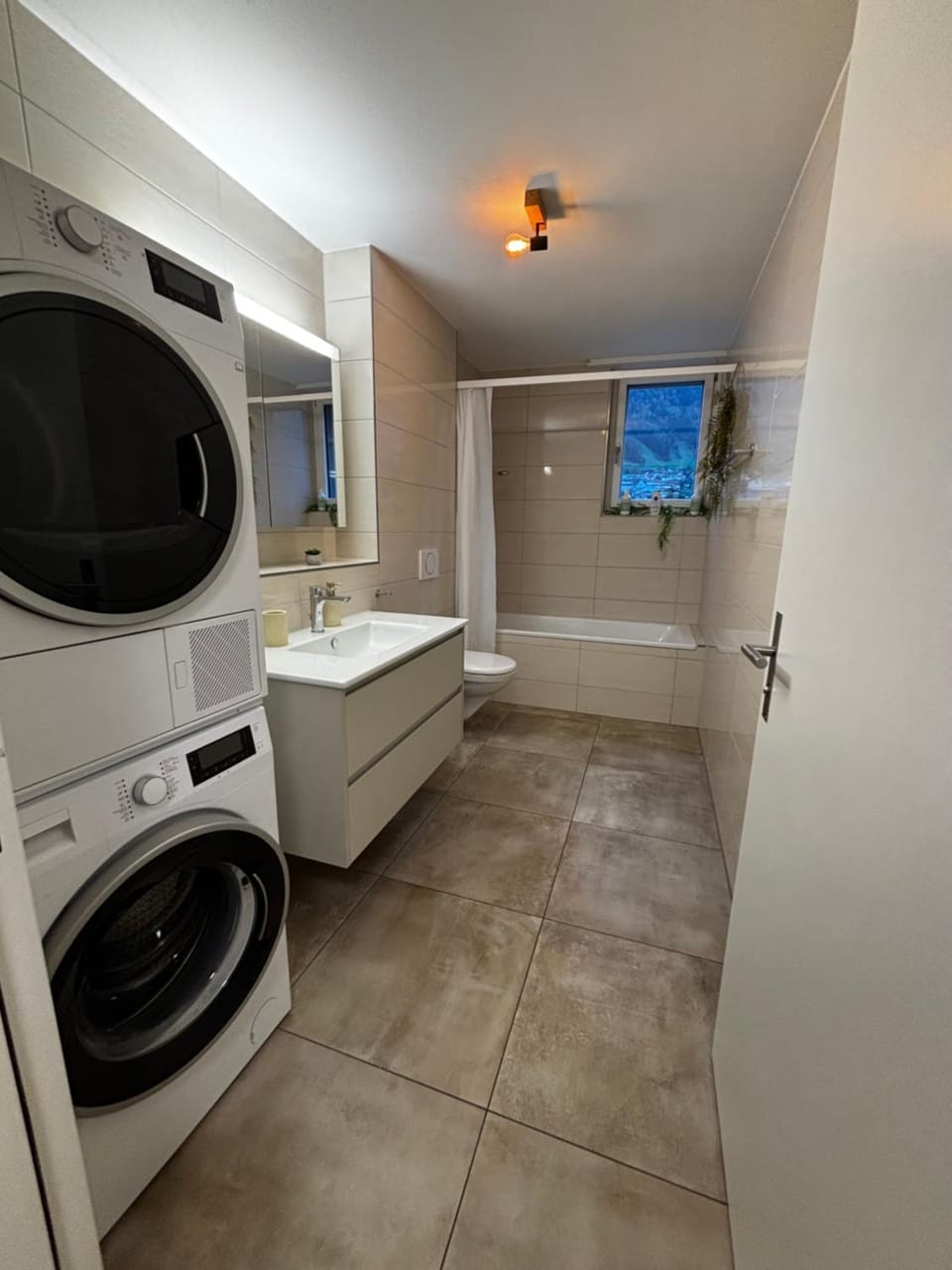 Bathroom, washing machine, dryer