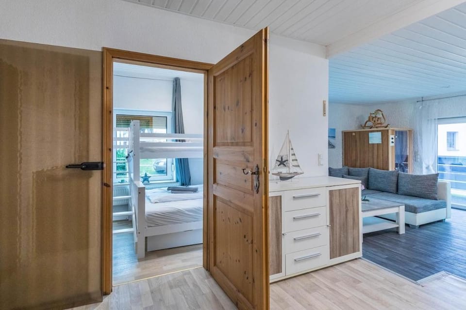 Bed, Living room, Seating area, Bedroom