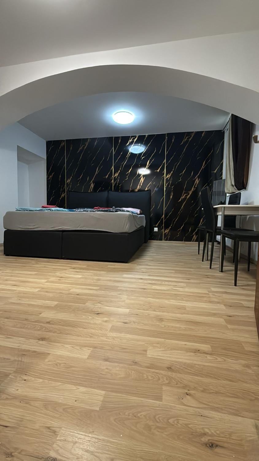 Bed, Living room, Seating area, Bedroom