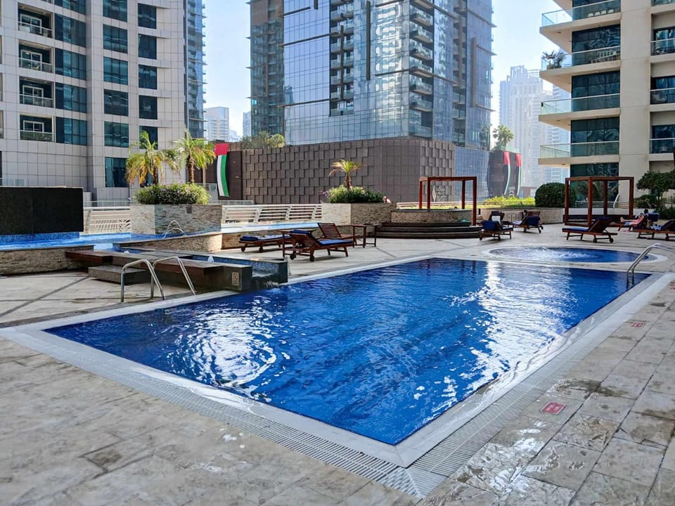 Property building, Day, Pool view, Swimming pool, sunbed