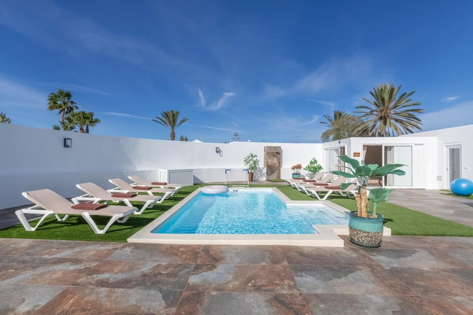 Property building, Living room, Swimming pool