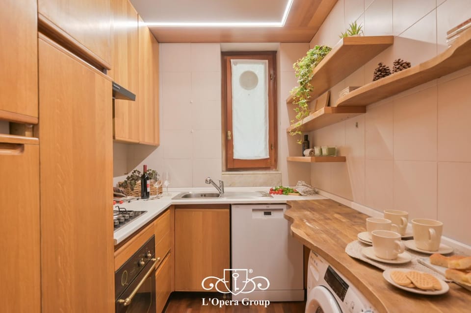 Kitchen or kitchenette, dishwasher, stove, washing machine