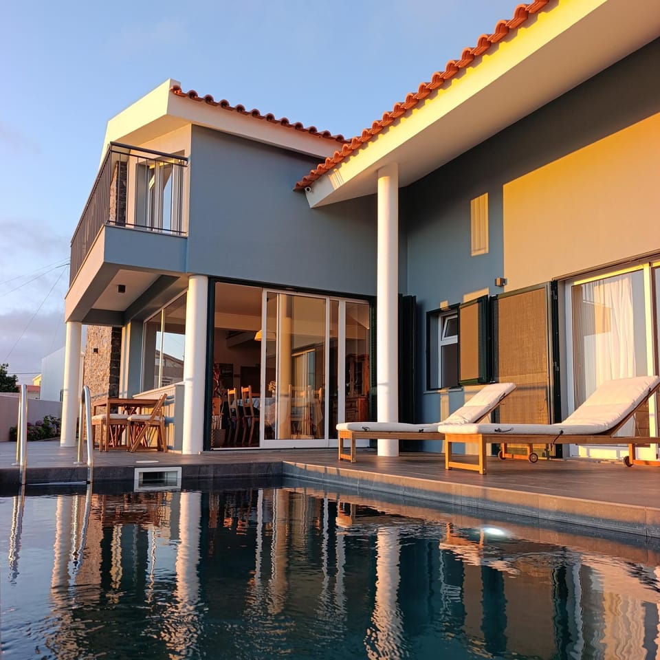 Property building, Swimming pool, Sunset, sunbed