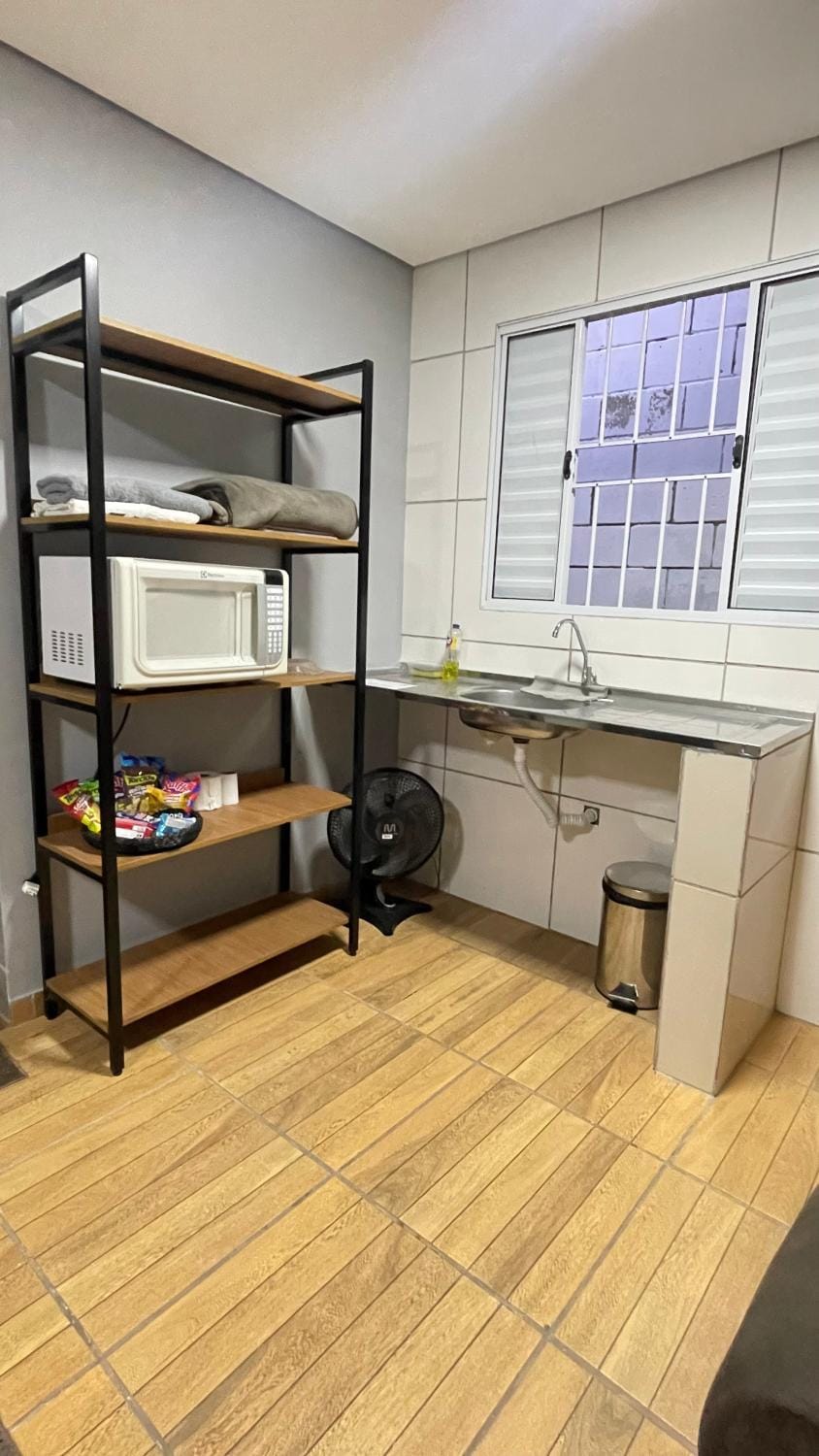 Kitchen or kitchenette, Seating area, Bedroom