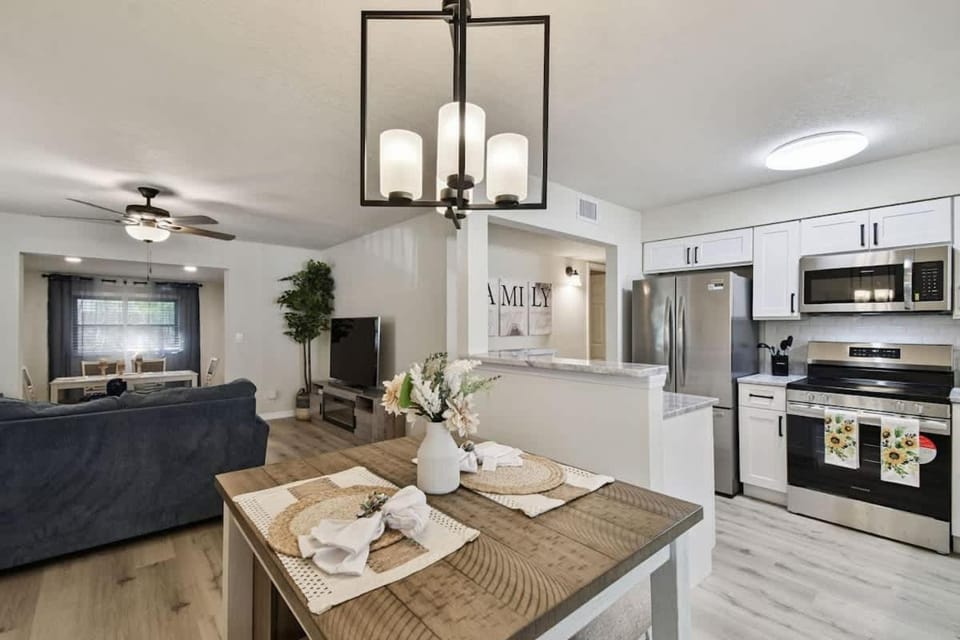 Kitchen or kitchenette, dishwasher, oven, stove