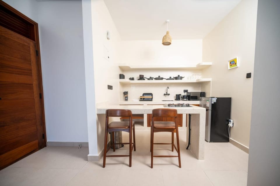 Dining area, minibar, stove