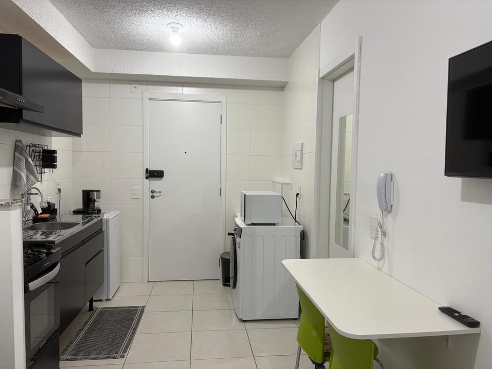 Kitchen or kitchenette, microwave, laundry
