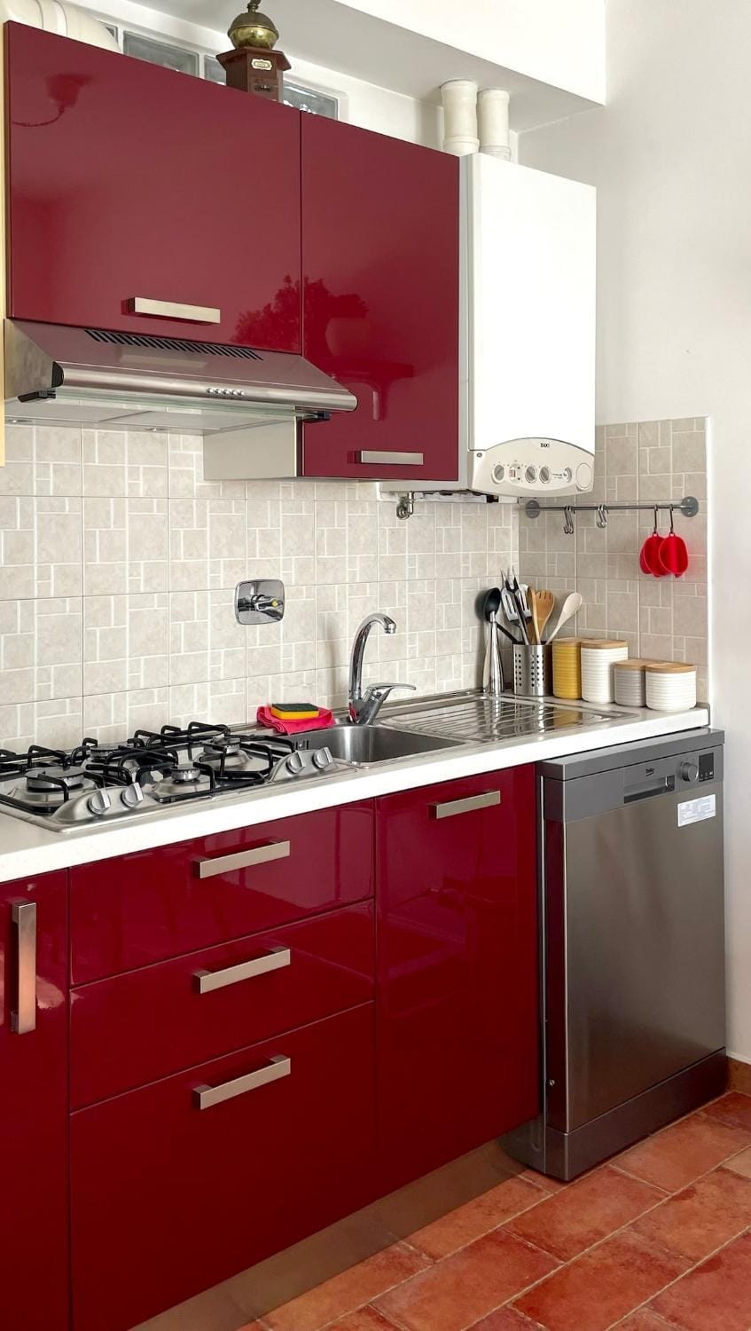 Kitchen or kitchenette, dishwasher, stove