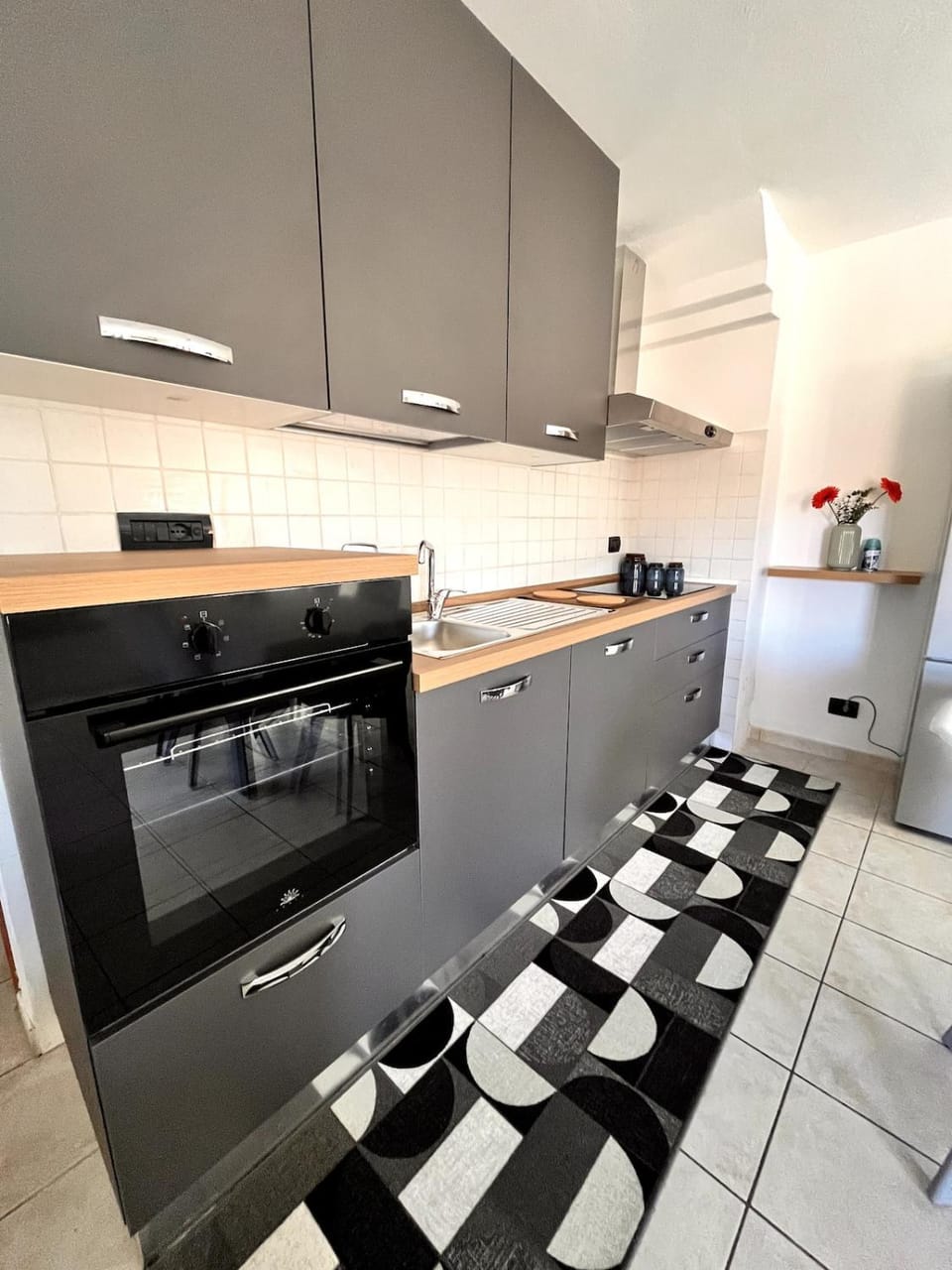 Kitchen or kitchenette, oven, stove