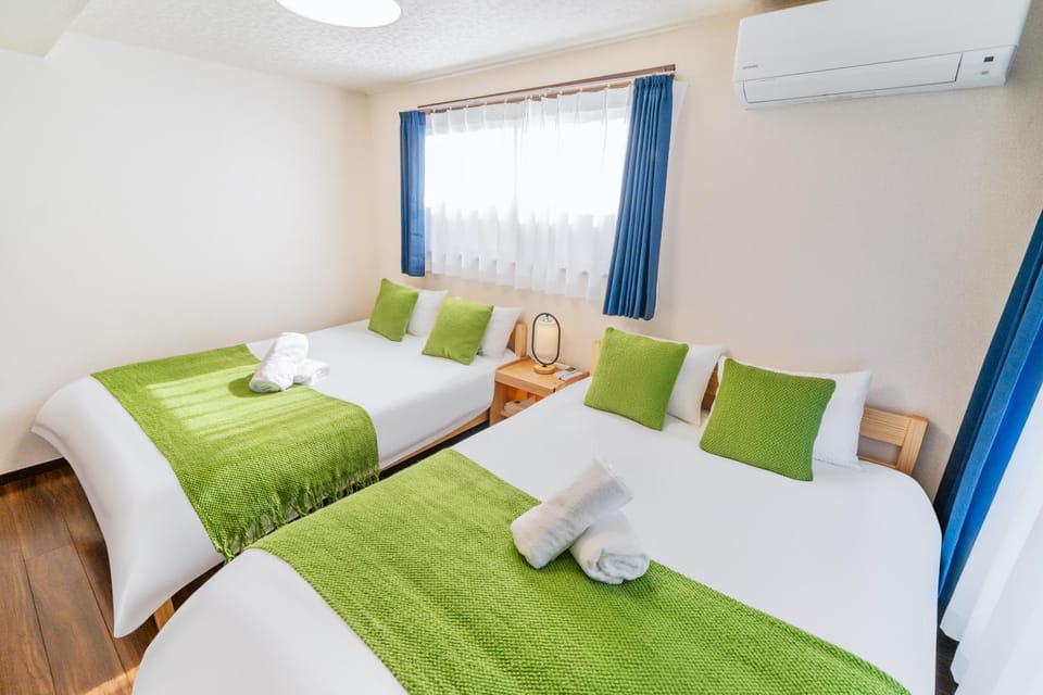 Bed, Photo of the whole room, Bedroom, towels, air conditioner