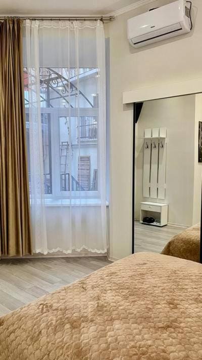 Bed, wardrobe, air conditioner