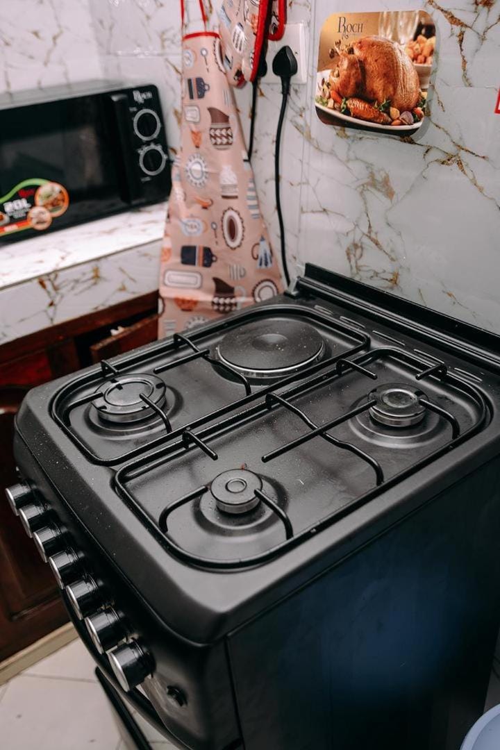 Kitchen or kitchenette, stove