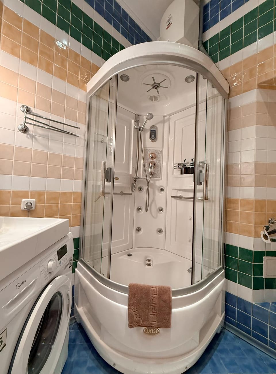 Shower, Toilet, towels, washing machine