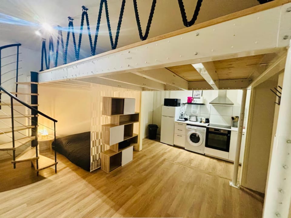 Kitchen or kitchenette, dishwasher, oven, stove, toaster