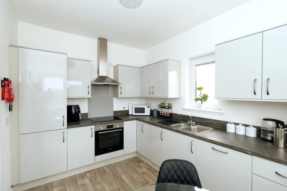 Kitchen or kitchenette, oven, stove, toaster