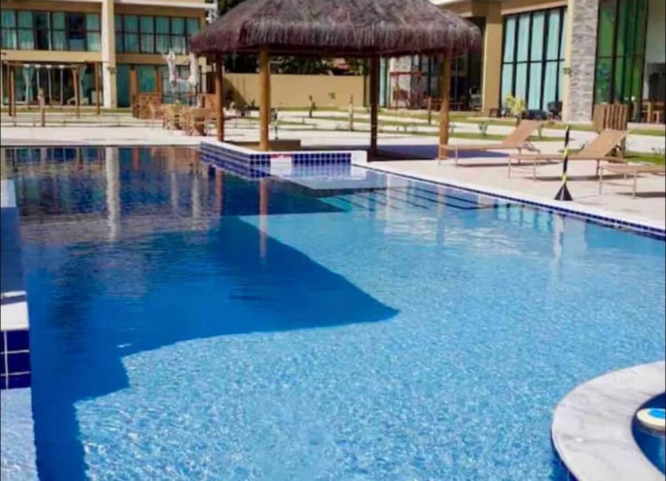 Swimming pool, sunbed