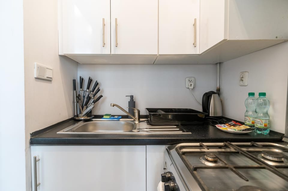 Kitchen or kitchenette, stove