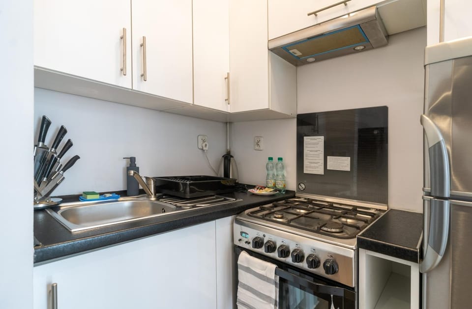 Kitchen or kitchenette, oven, stove