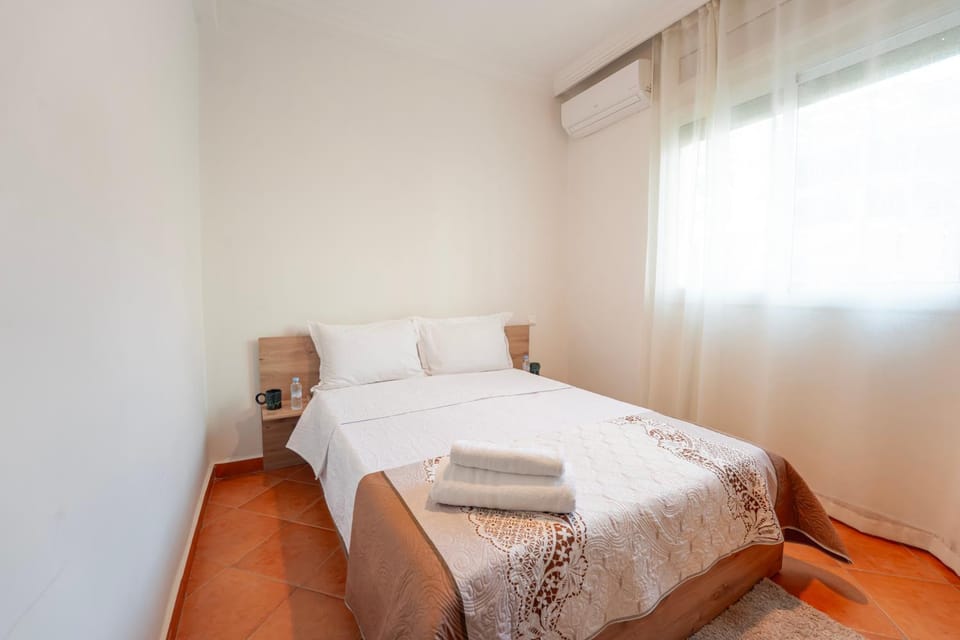 Bed, Photo of the whole room, Bedroom, towels, air conditioner